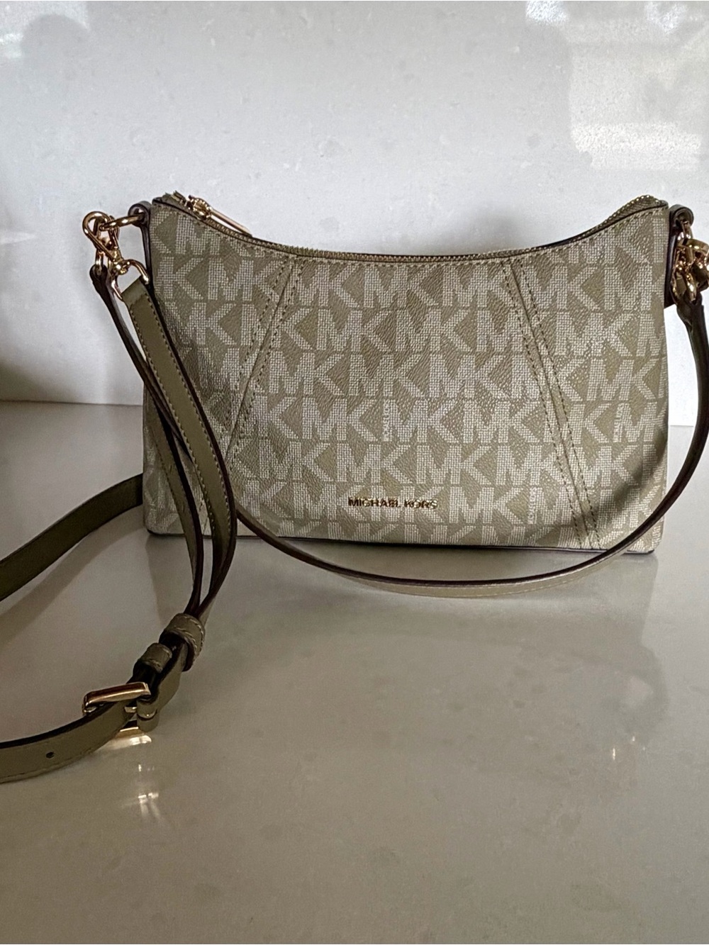 Michael Kors Medium signature logo crossbody bag.